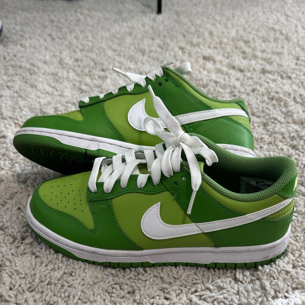 These sneakers are Nike Dunk Low 'Chlorophyll'
